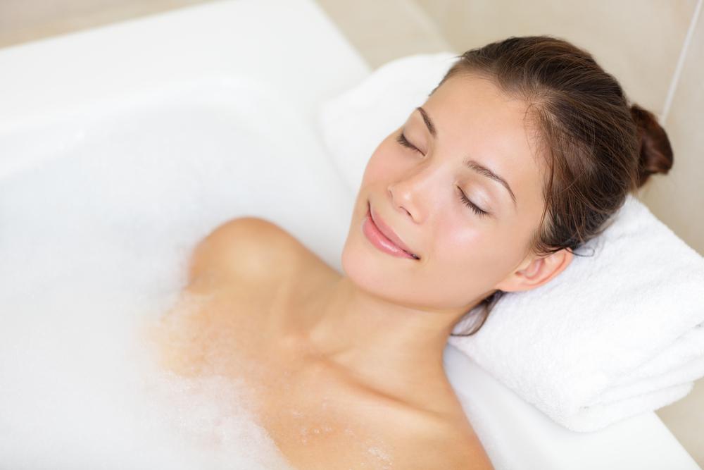 Woman relaxing in tub