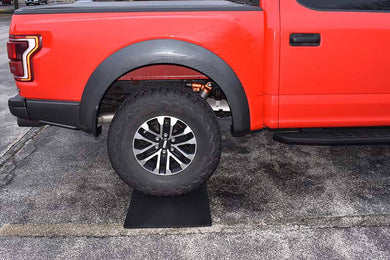 Electric Radiant heating rubber mat keep driveway snow and ice free under truck